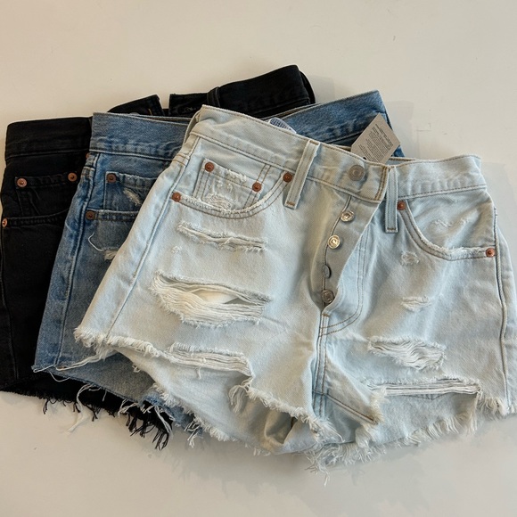 Three pairs of Original fit high rise Levi’s 501 denim shorts